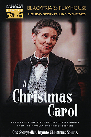 ASC-Christmas_Carol-2025-Program Program cover of "American Shakespeare Center Blackfriara Plahouse Holiday Storytelling Event 2025, A Christmas Carol, adapted for the stage by Greg Oliver Bodine from the novella by Charles Dickens. One Storyteller. Infiniite Christmas Spirits." Photo of Angela Iannone in mid-18th cenrtury dark blue dinner jacket, elaboratly patterend vest, white fluff-front shirt, and large blue bowtie with white trim.